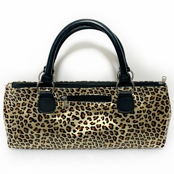 Primeware Insulated Single Bottle Wine
Clutch purse in a leopard print pattern. - Picture 1 of 5
